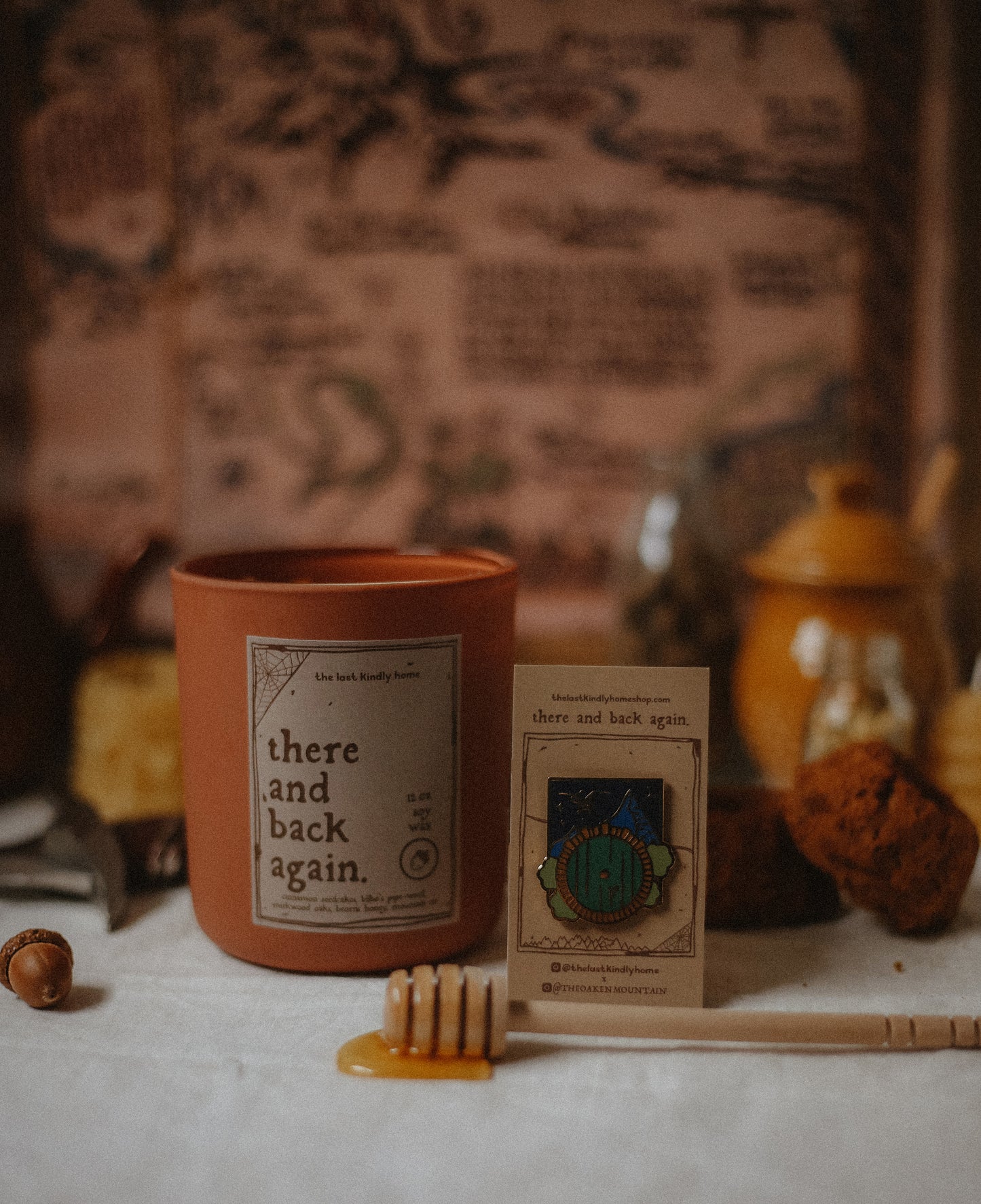 there and back again candle + pin