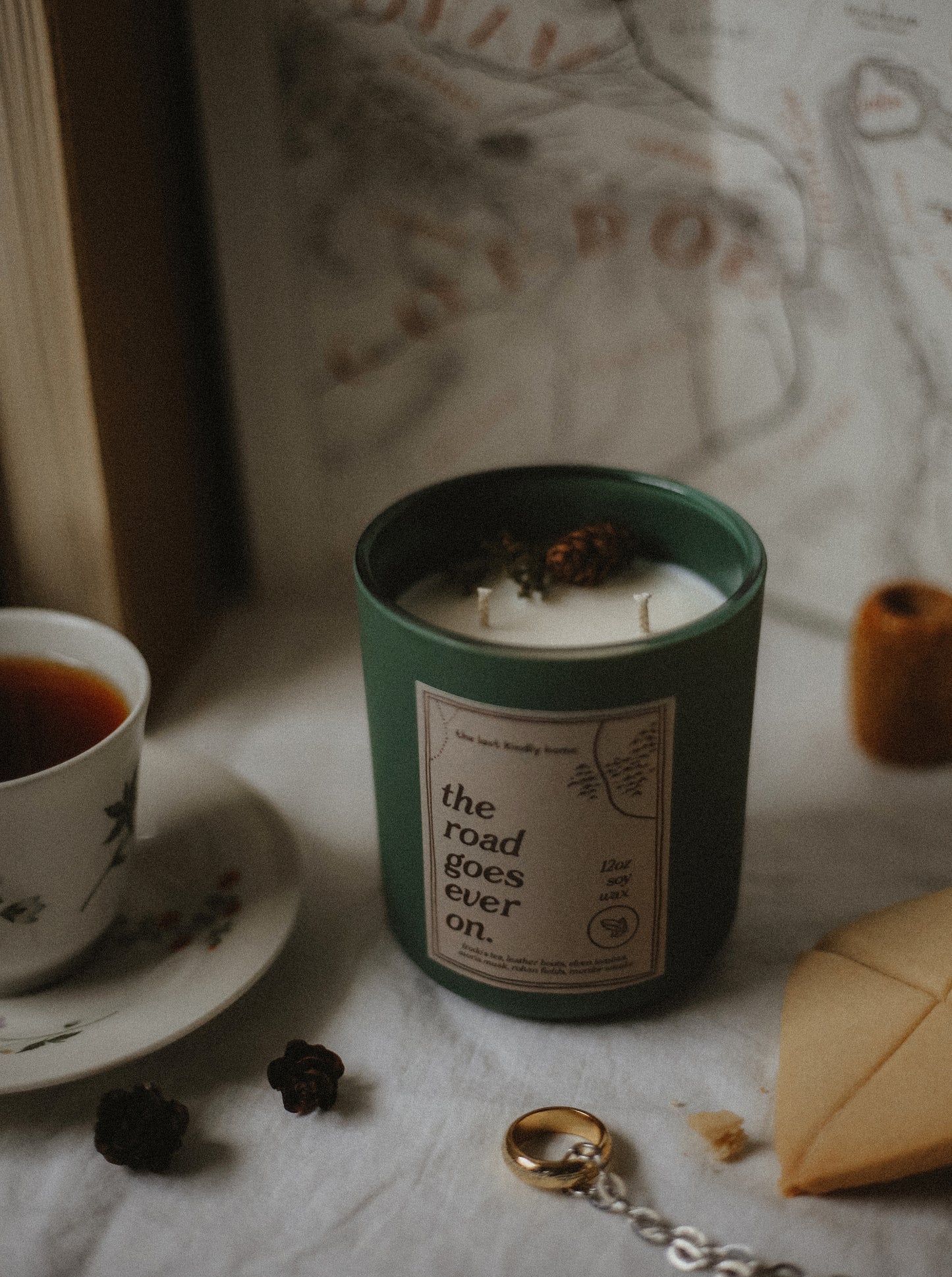 the road goes ever on candle + pin