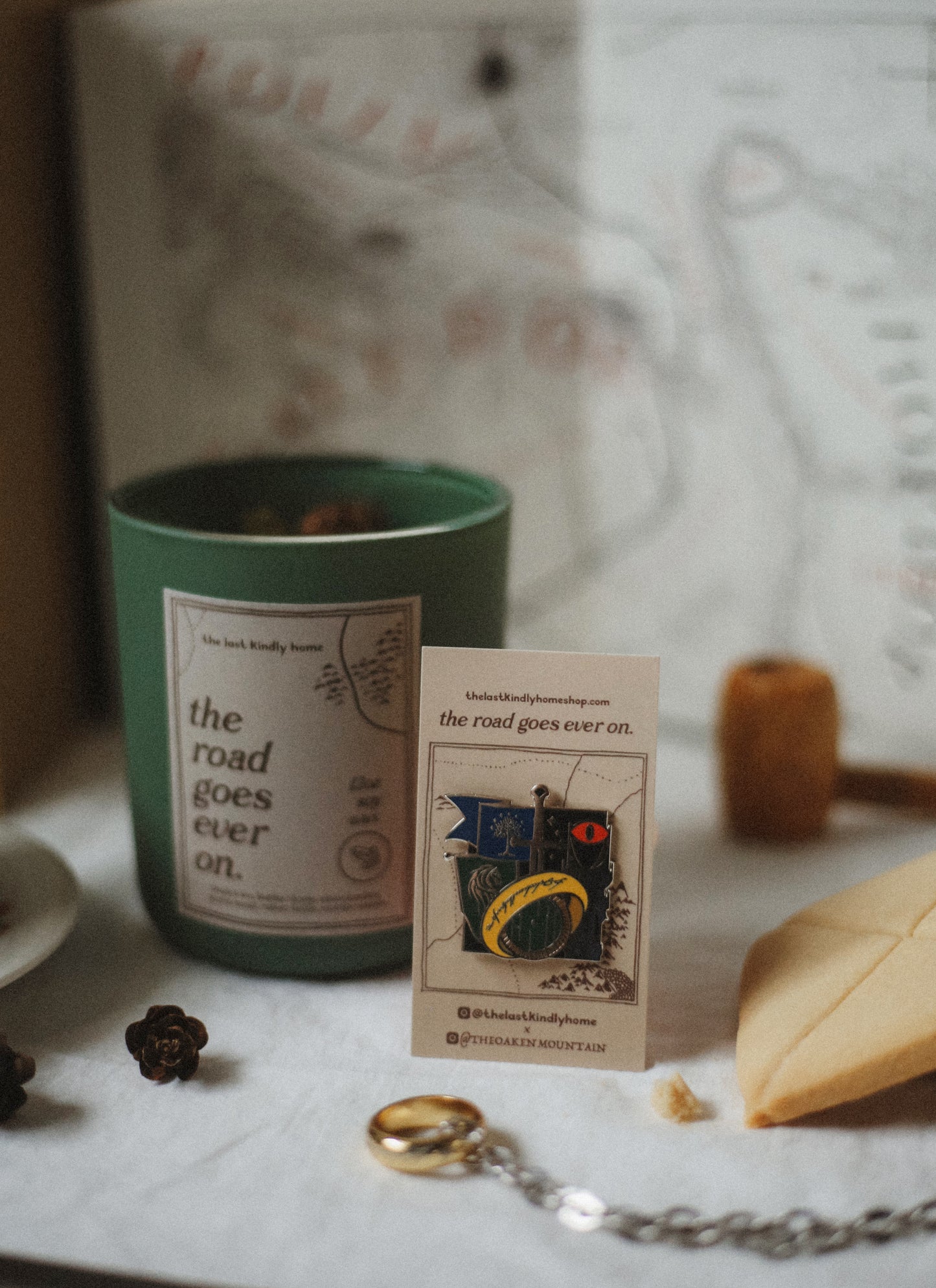 the road goes ever on candle + pin
